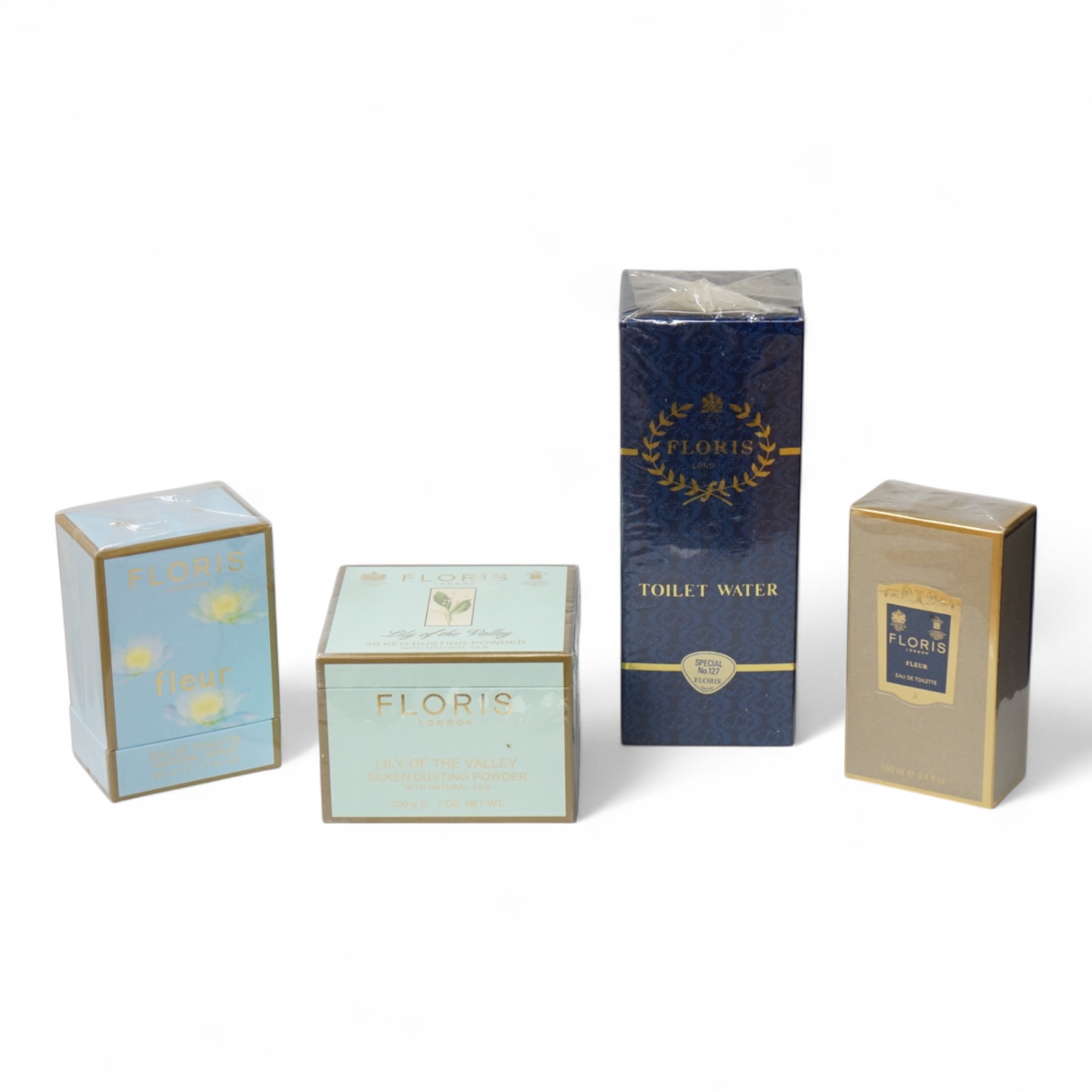 Three bottle of ladies unopened Floris perfumes comprising two bottles of Fleur and one bottle of Special No. 127, together with Floris Lily of the Valley silken dusting powder, each boxed and cellophane wrapped